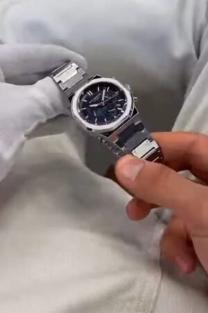 Silver Wristwatch on White Fabric